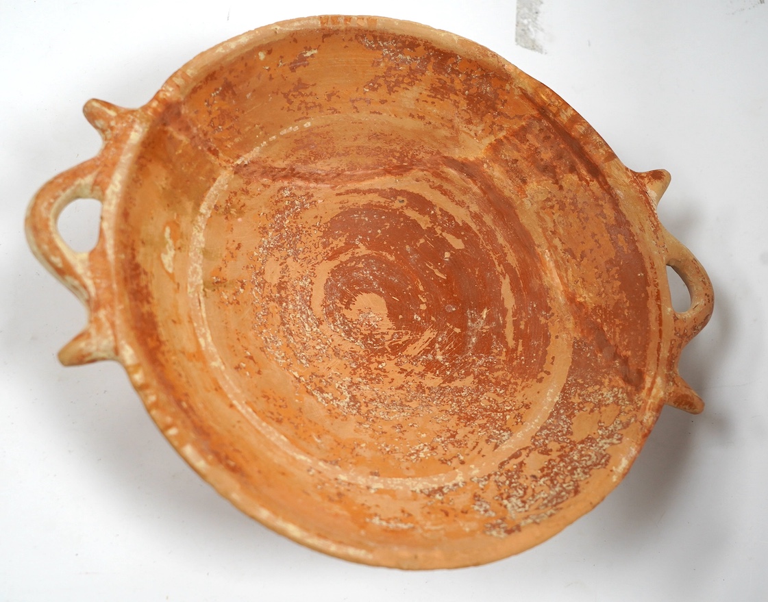 An Ancient Greek terracotta two-handled dish, circa 5th/4th century BC. Condition - good restored condition